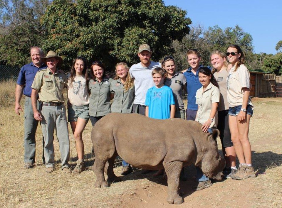  Hugh Grosvenor, fourth from right in a blue shirt, with his pal Prince Harry at a rhino conservation project in South Africa last year