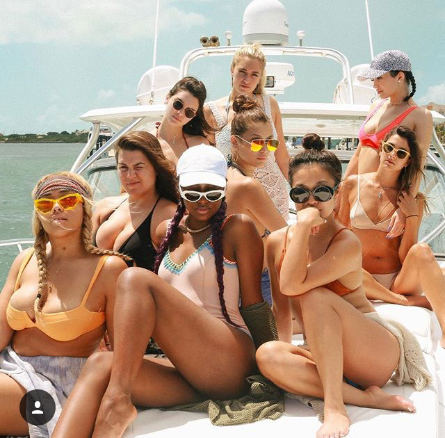  The whole gang posed up for a picture on their yacht for the day