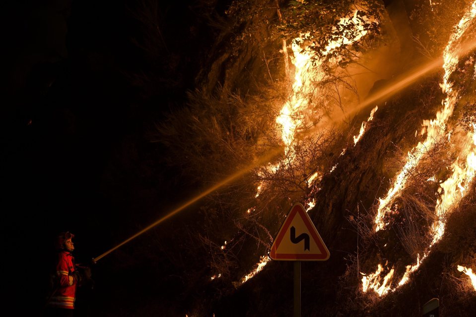  Images showed firefighters dousing forest fires Sao Lourenco do Douro in Baiao, Portugal