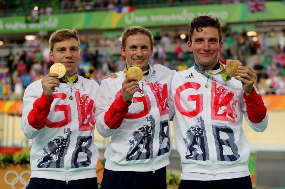  Philip Hindes, Jason Kenny and Callum Skinner celebrate their gold medals in the team sprint