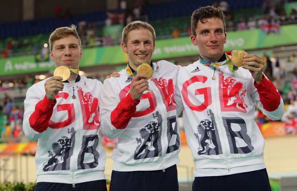 Jason Kenny (centre) and pal Callum Skinner (right) won Olympic gold in the men's team sprint on Thursday