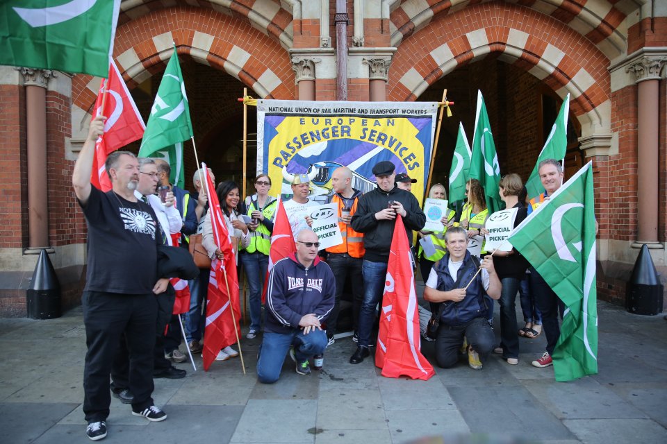  Union members have gathered outside St Pancras Station in a picket line complaining about 'work - life' balance in their job