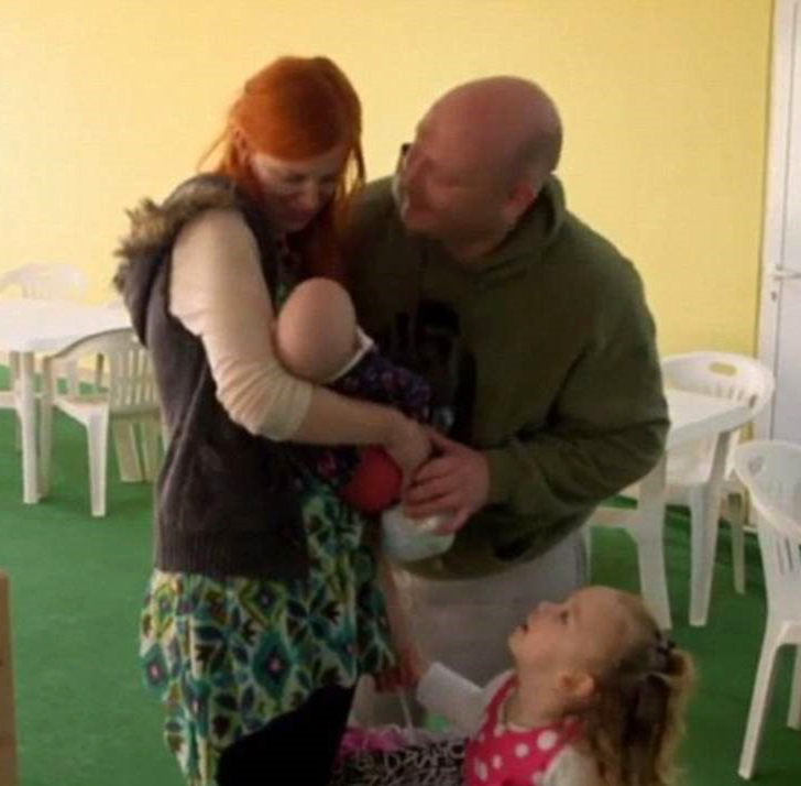 The family together - mum and dad with daughter Rainbow and baby Blossom