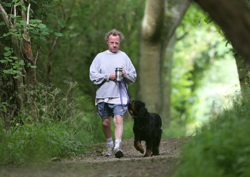  Andy Hill seen out walking his dog as manslaughter charges hang over his head