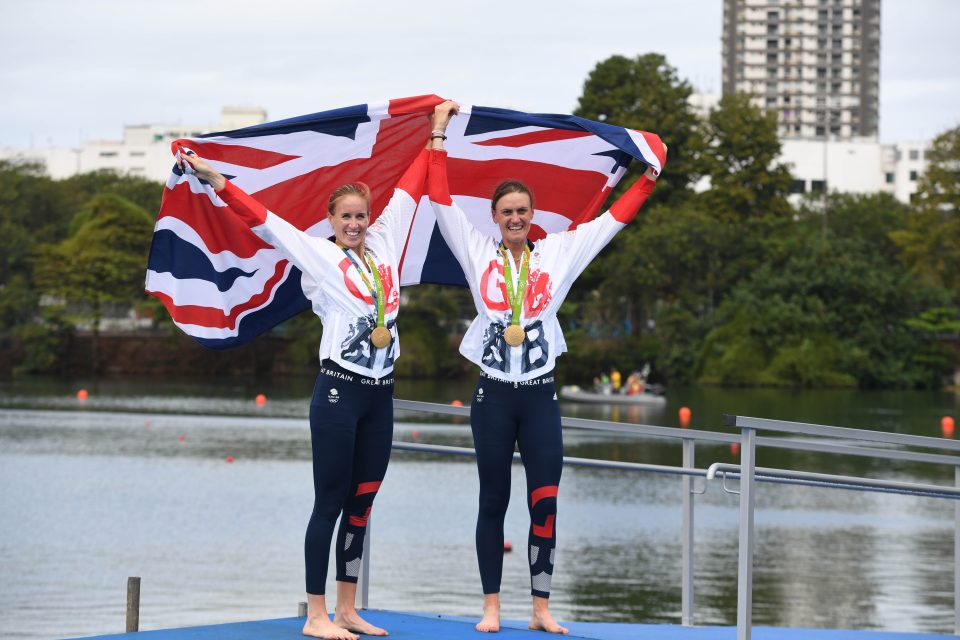  Champions ... Team GB winners hold flag aloft following stunning victory