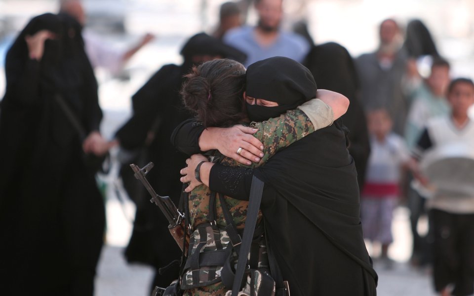  Hugs . . . woman embraces soldier after liberation