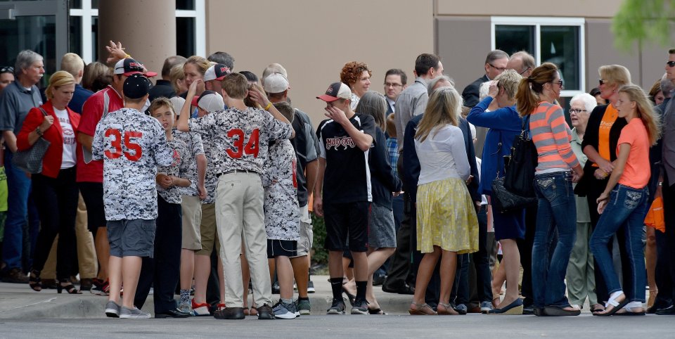 Crowds of the young boy's family came together for Caleb's funeral in Kansas