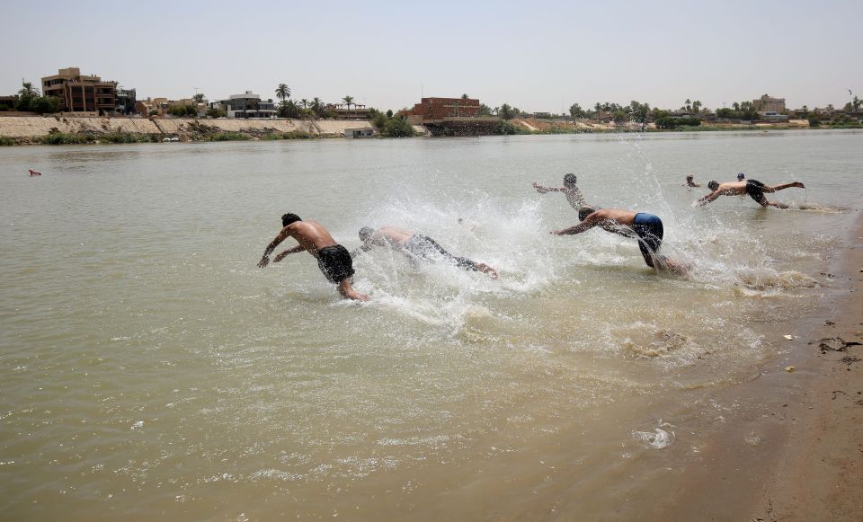 Desperate Iraqis have seen their economy slump as people become too hot to physically function