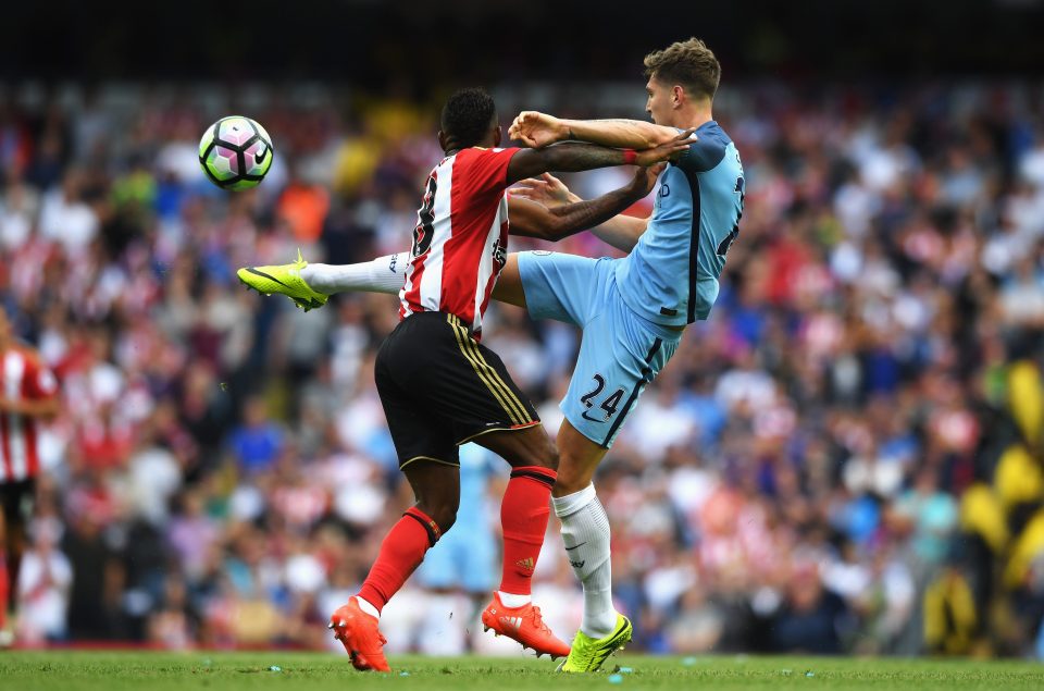 John Stones sees off pressure from Jermain Defoe as he impresses in his debut