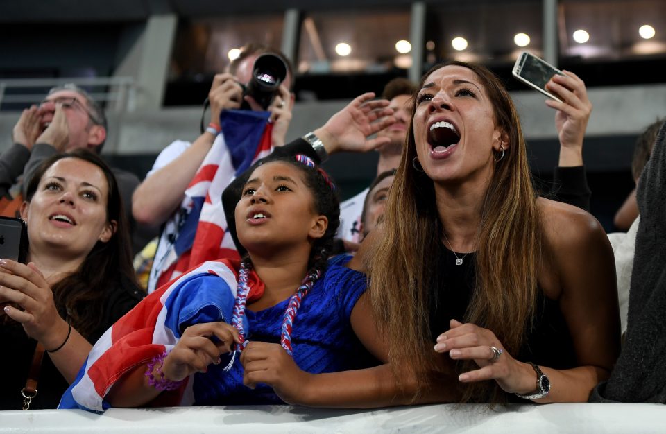 Mo Farahs wife Tania and step-daughter Rhianna watch on as the distance star claims a fourth Olympic title in Rio