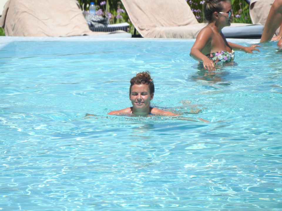  Taking a dip... Coleen enjoys the hotel's swimming pool