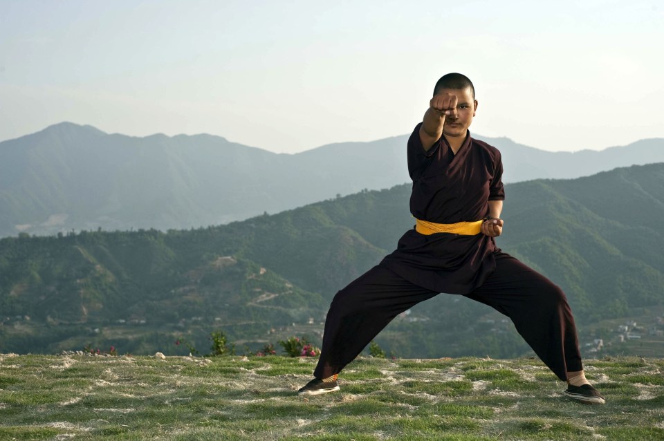  Female Buddhists at the Druk Amitabha Mountain nunnery have become experts at the deadly martial art of kung fu