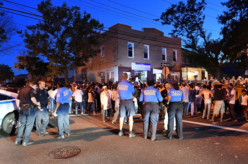 General views of the aftermath of the murder of an imam in Queens