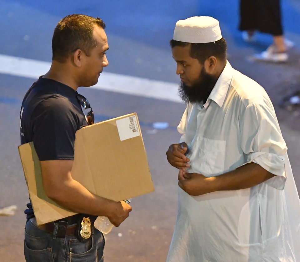 General views of the aftermath of the murder of an imam in Queens