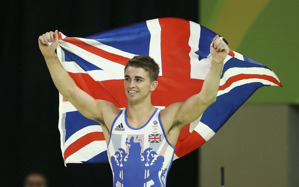  Whitlock with the Union Jack after the Brit's second gold in under two hours