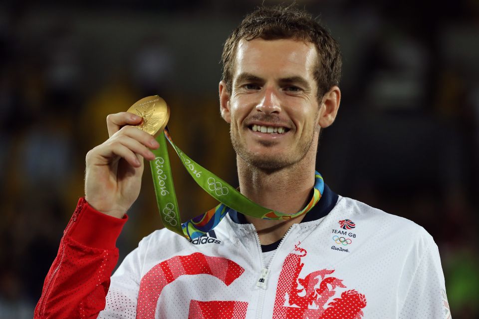  Andy Murray with his gold medal following victory in the men's singles final