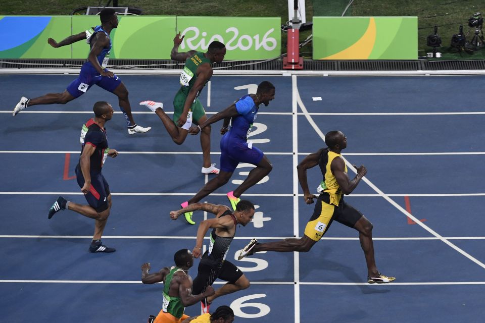  Usain Bolt crosses the line in first place to take yet another Olympic gold medal