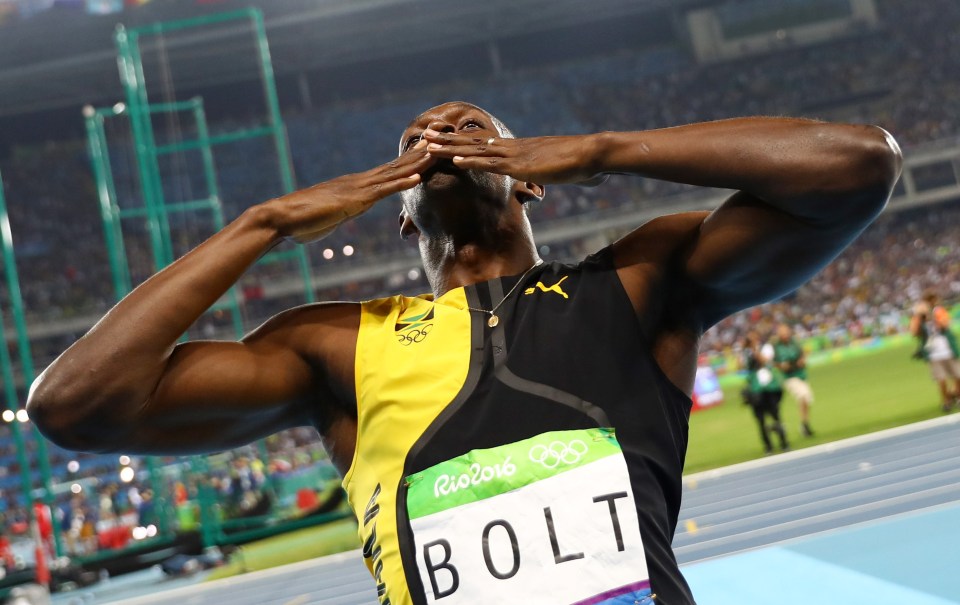  Usain Bolt takes in the adulation after winning his third straight Olympic 100m title