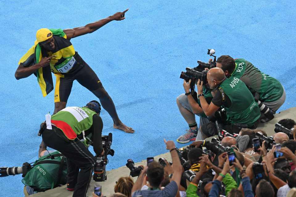  Usain Bolt poses for the cameras after his stunning win