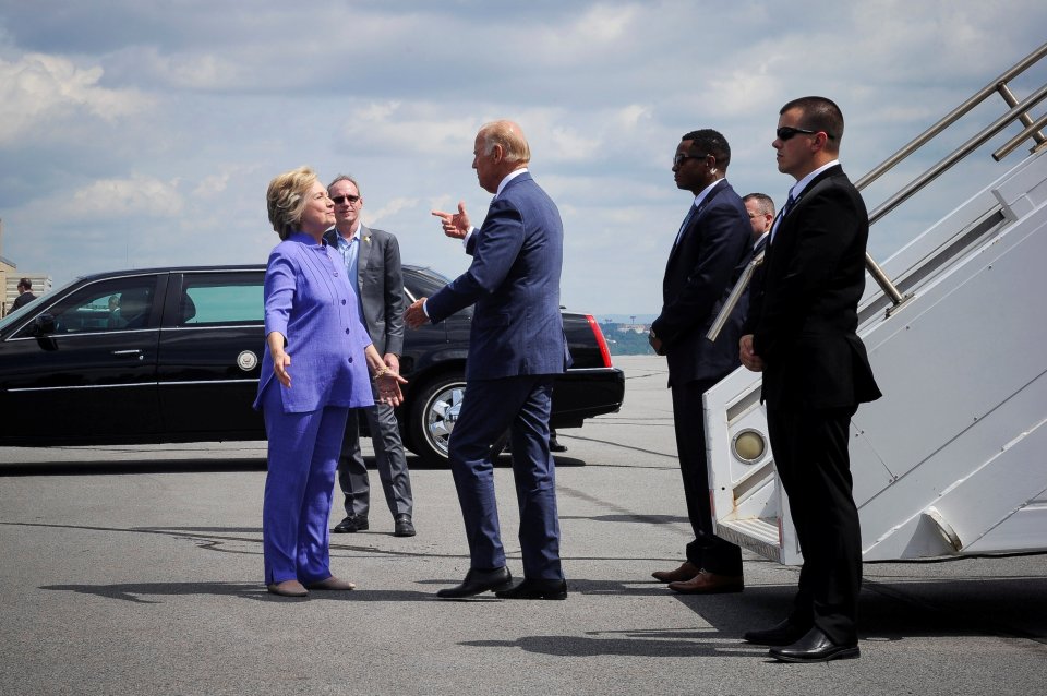  Hillary welcomes Vice President Joe Biden in her beloved purple pantsuit