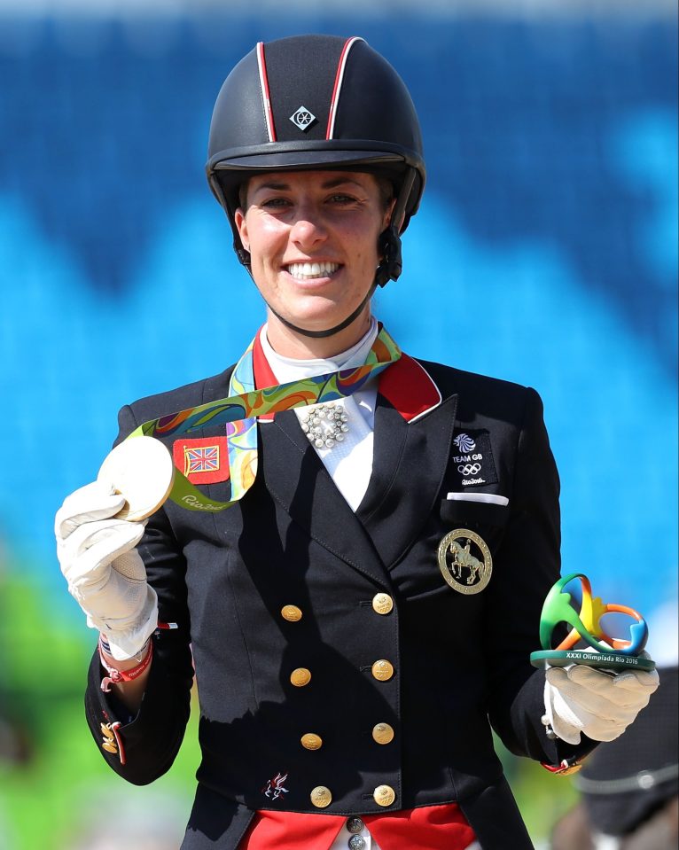  Charlotte Dujardin celebrates on the podium