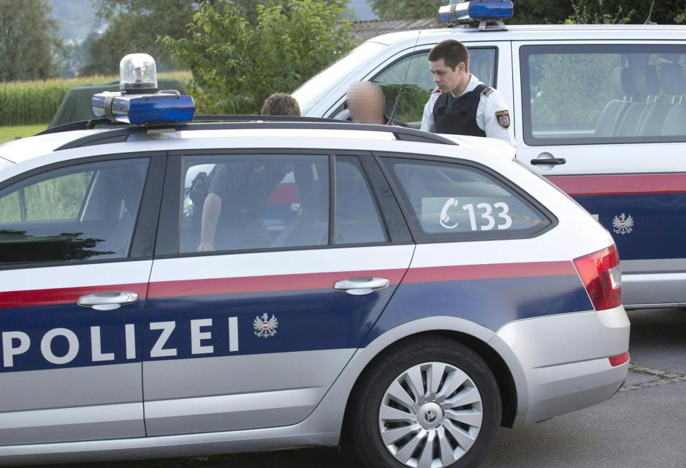  Austrian policemen arrested a suspect on August 16 after he had attacked two train passengers with a knife