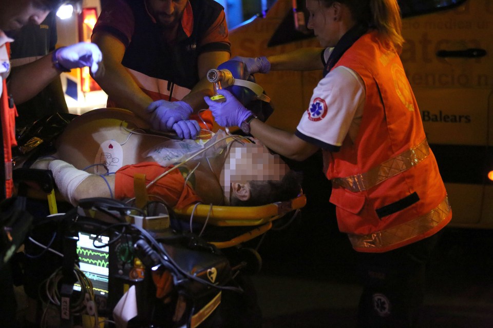  Medics desperately fought to revive the man, who was gunned down outside an empty supermarket in Majorca