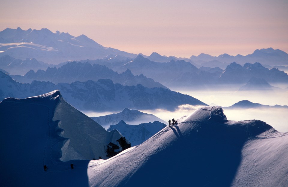 Climbers on the Summit Ridge Mont Maudit in the French Alps (stock image)