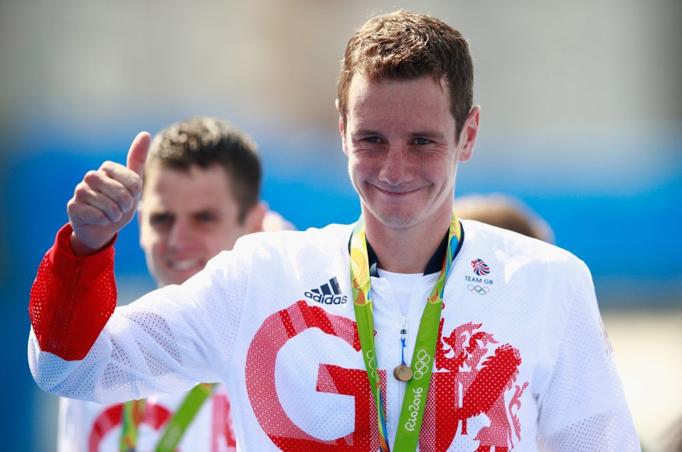 The Burvnors . . . Alistair and Jonny Brownlee celebrate taking home Gold and Silver in the triathlon