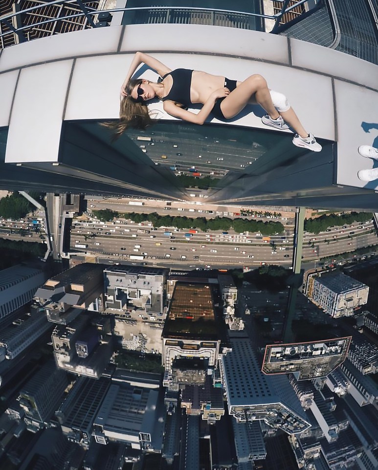 The fearless young woman took photos hundreds of feet above the ground