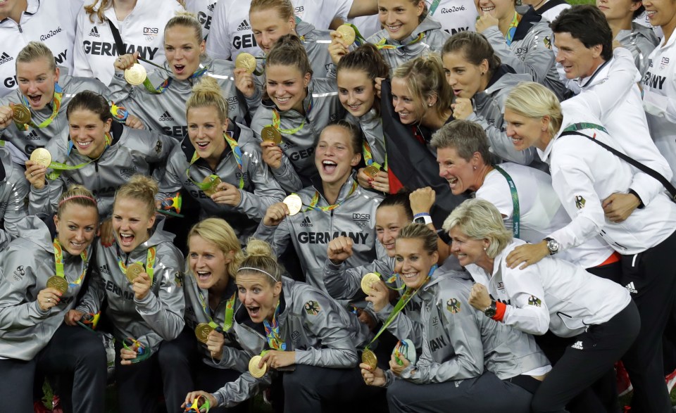 Germany celebrate after winning a historic gold in women's football