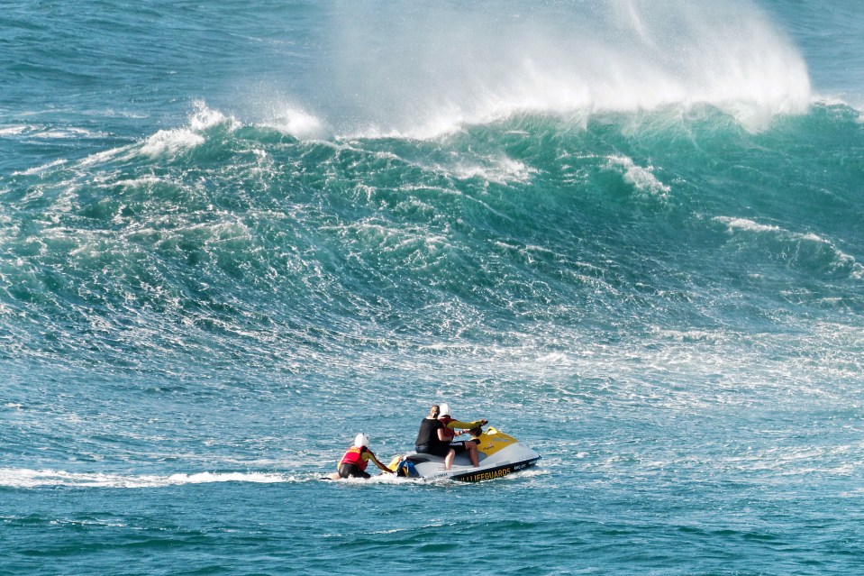  Lifeguards managed to rescue all three people but the man died in hospital, the Maritime and Coastguard Agency said