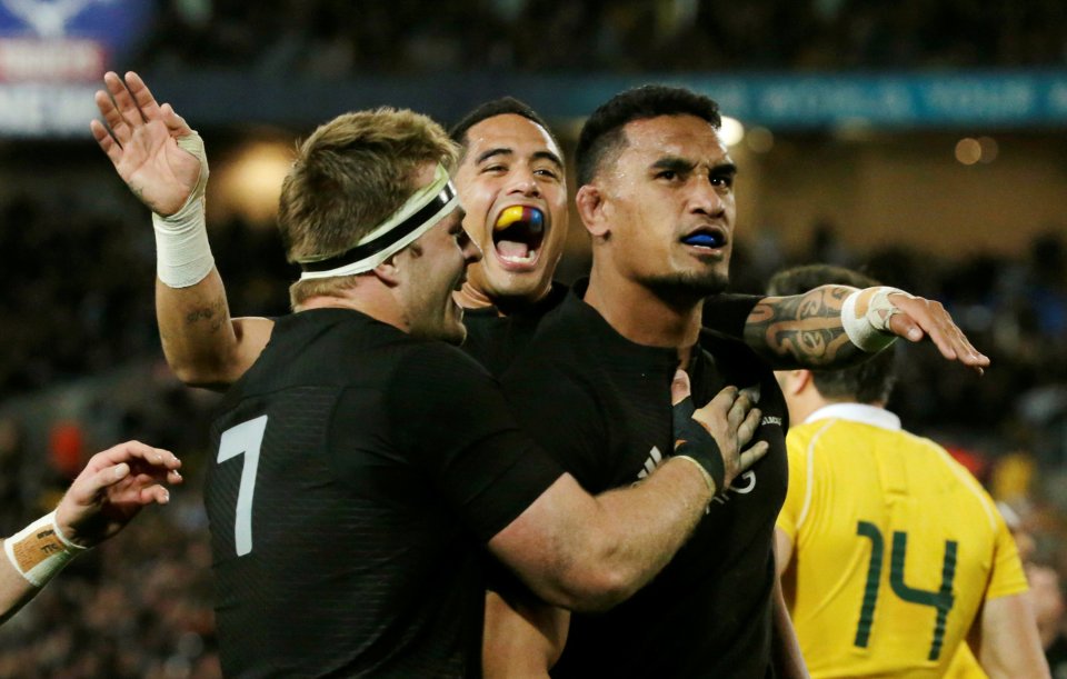  Jerome Kaino celebrates after charging down a kick before touching down