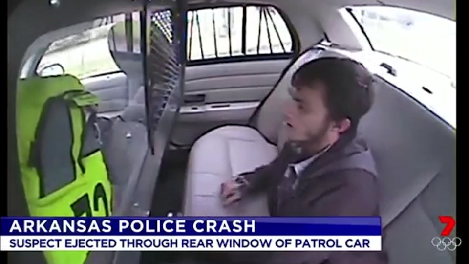  Younger appears to loosen his handcuffs shortly before the crash