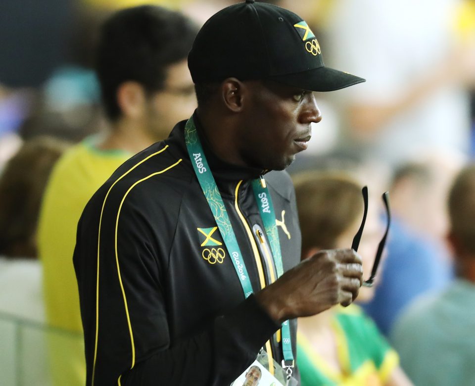 Triple-triple winner Usain Bolt watches on at the Maracana Stadium