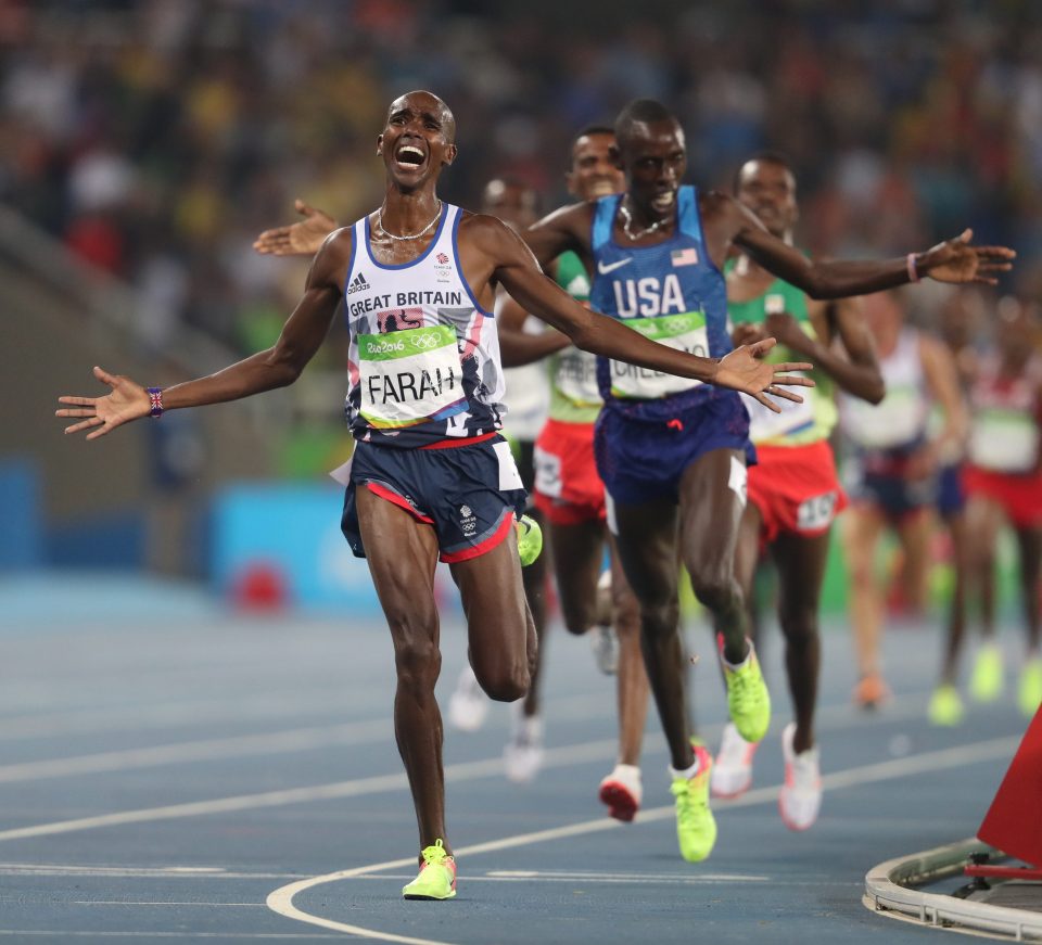  Mo Farah spreads his arms wide as he crosses the line an Olympic champion for the fourth time