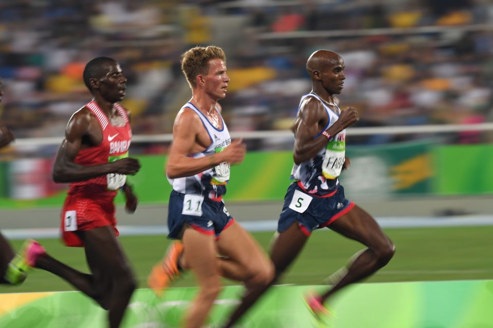  Mo Farah and fellow Brit Andrew Butchart run on the front of the pack in the 5,000 metres final