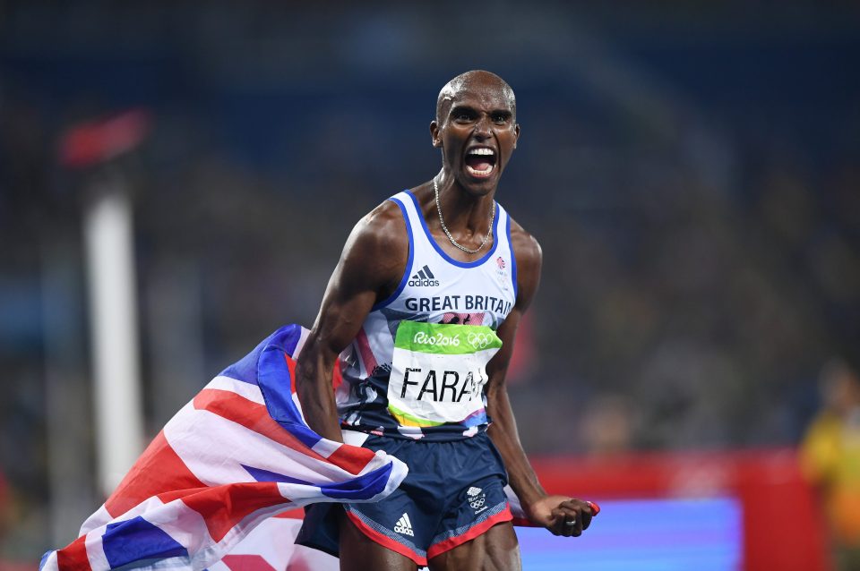  Mo Farah gives a big cheer while holding the Union Jack as he celebrates 5,000 metres gold