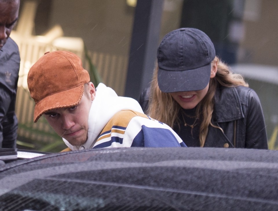 The couple kept close to each other as they headed to their waiting car