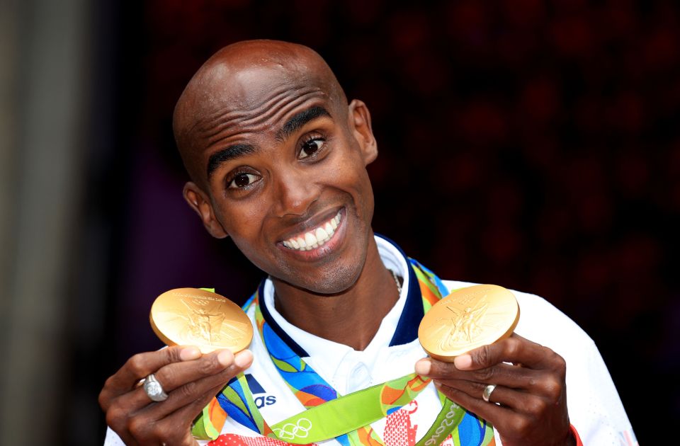 Mo for it . . . GB star Mo Farah celebrates winning long distance double-double in Rio