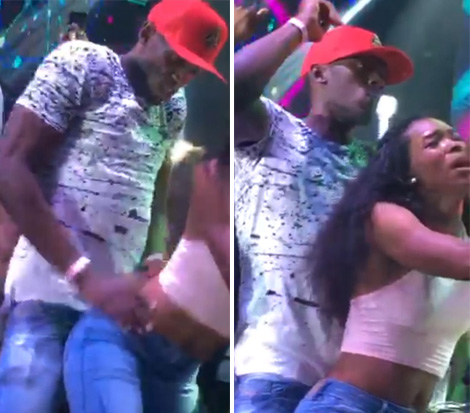 Usain Bolt dances with a twerking club goer on Sunday at club All In