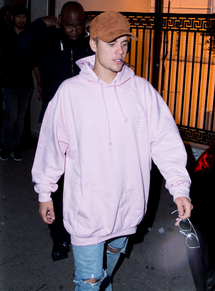 Justin wore a sexy pink hoodie for the nightclub outing