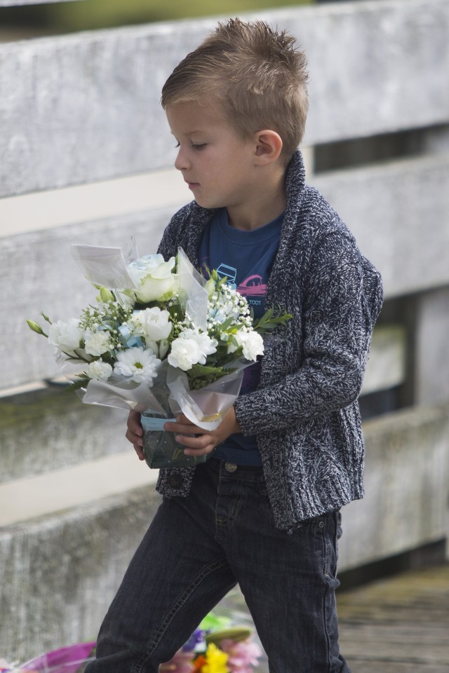  Georgio, the son of victim Daniele Polito, laid flowers at the scene to pay tribute to his dad