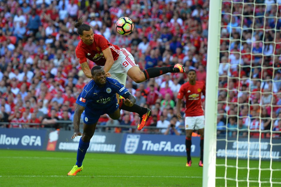 Zlatan gets up high to head in the winner in the Community Shield against Leicester – his first competitive goal for the club