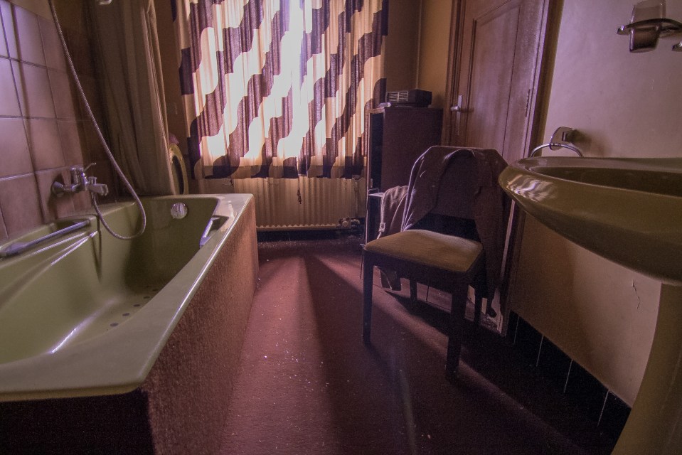 The bathroom also remains untouched from when the house was abandoned by its dentist owner