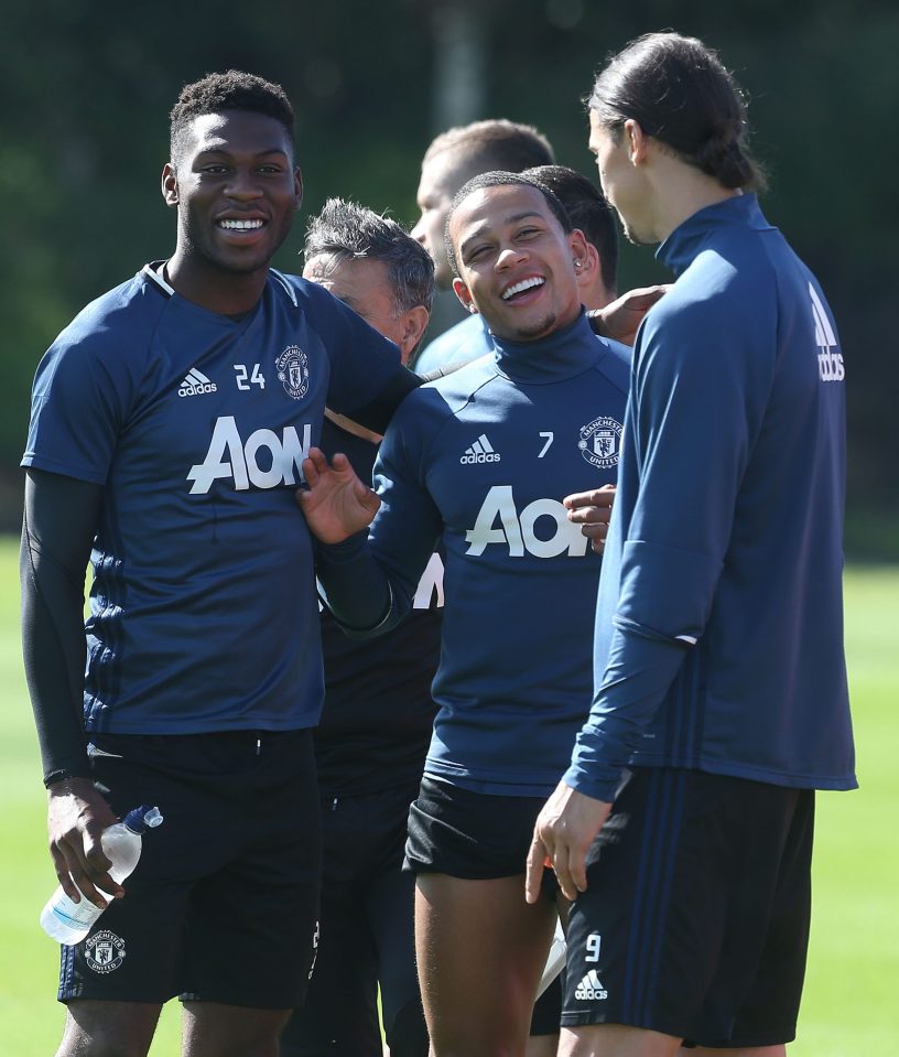 Zlatan Ibrahimovic enjoys a laugh with Timothy Fosu-Mensah and Memphis Depay