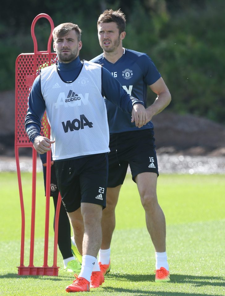 Luke Shaw and Michael Carrick hard at work during Uniteds training session