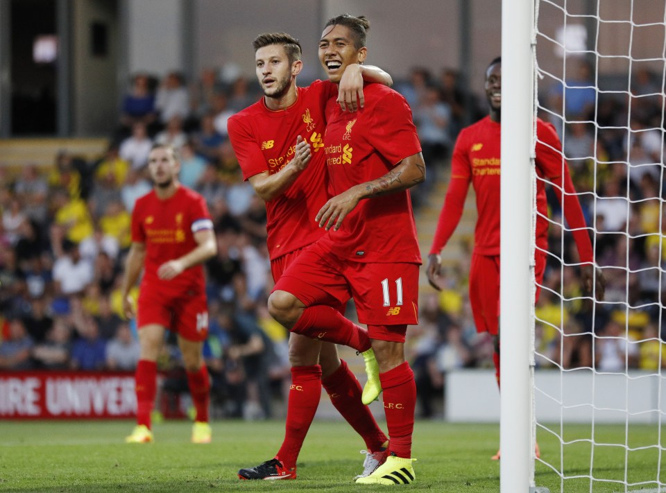 Adam Lallana congratulates his Brazilian team-mate after his goal