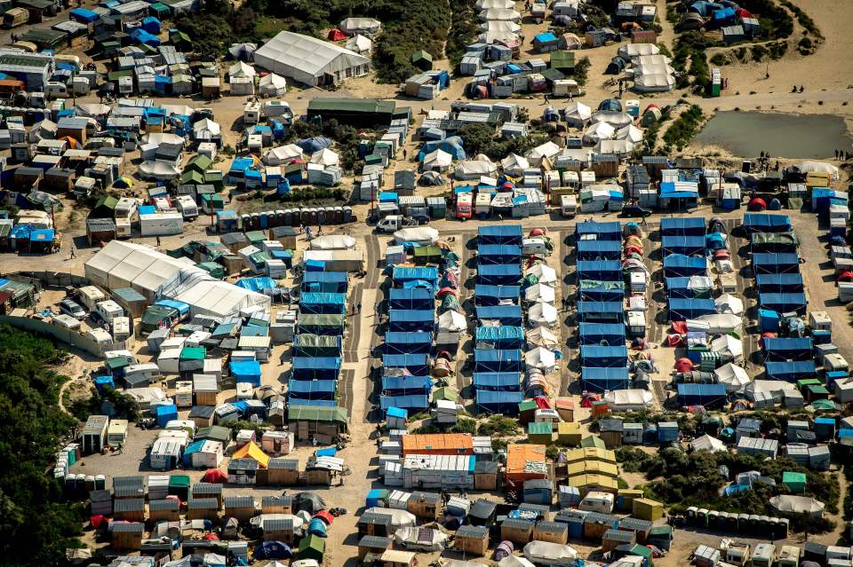  Blue tents . . . overflow area with distinctive tents provided by the French government