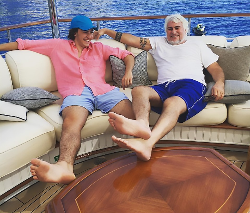  Sergey Sarkisov with his father Sergey Snr on a luxury yacht